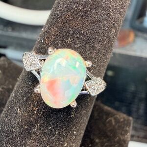 1.7 carat Ethiopian opal adjustable ring light base with rainbow